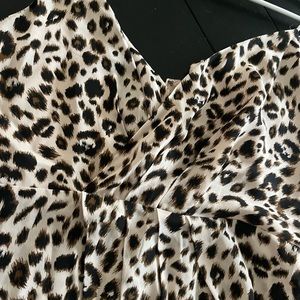 Romantic snake skin low cut silk top. Brand new